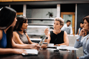 Woman leading a business meeting